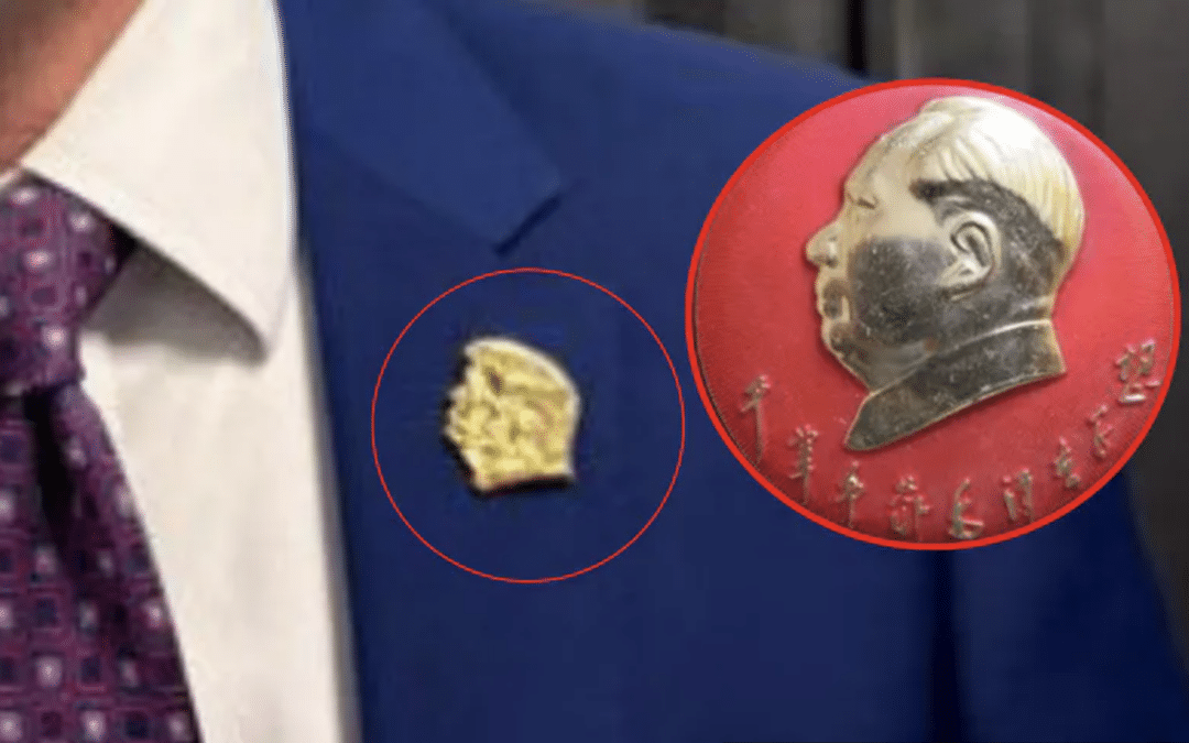 FCC official appears with golden Trump pin that some likened to Mao